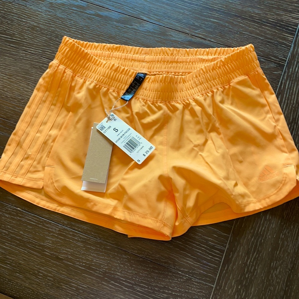 Orange Adidas shorts